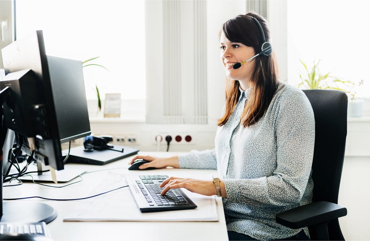 Lady speaking on headphone Retina